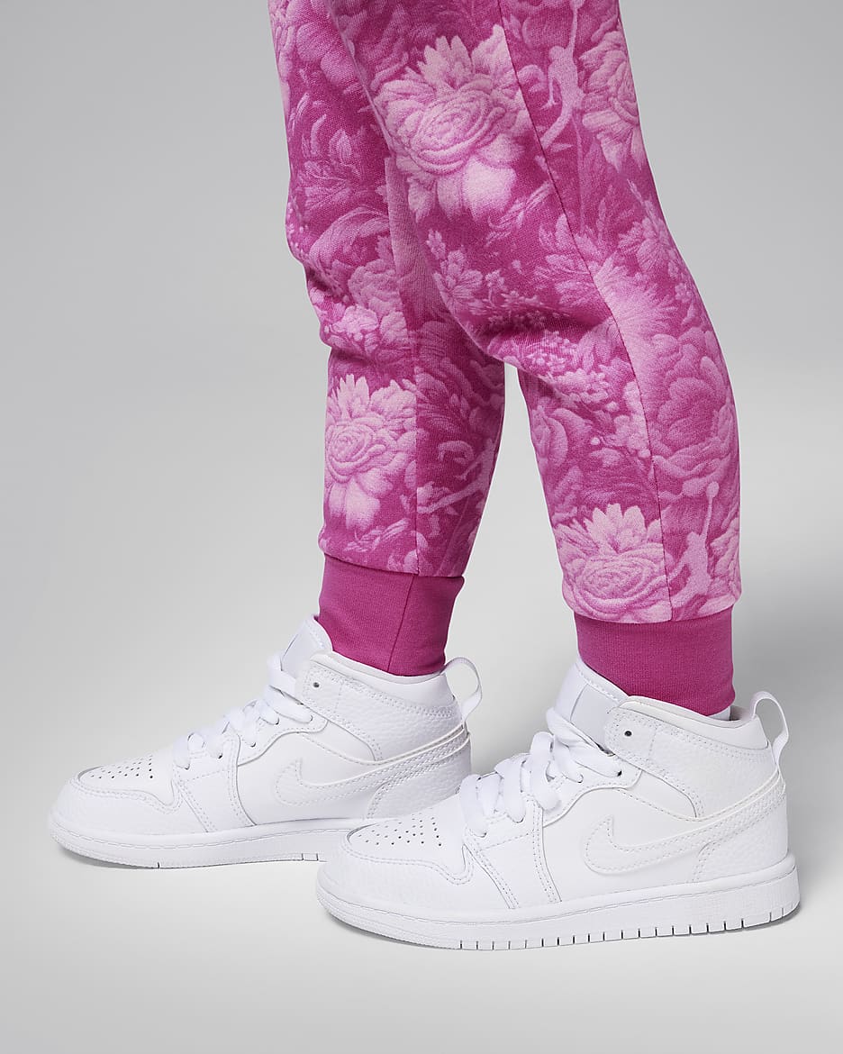 Pink floral nikes deals